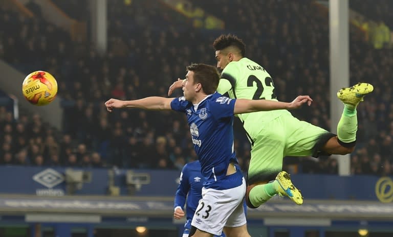 Manchester City's defender Gael Clichy (R) challenges Everton's defender Seamus Coleman (L) during the English League Cup semi-final first leg football match in Liverpool, England on January 6, 2016