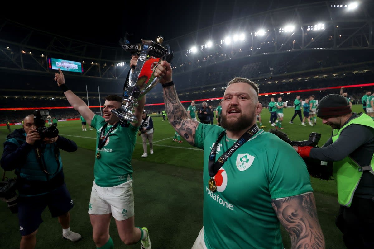 Ireland celebrate winning the Six Nations title (PA Wire)