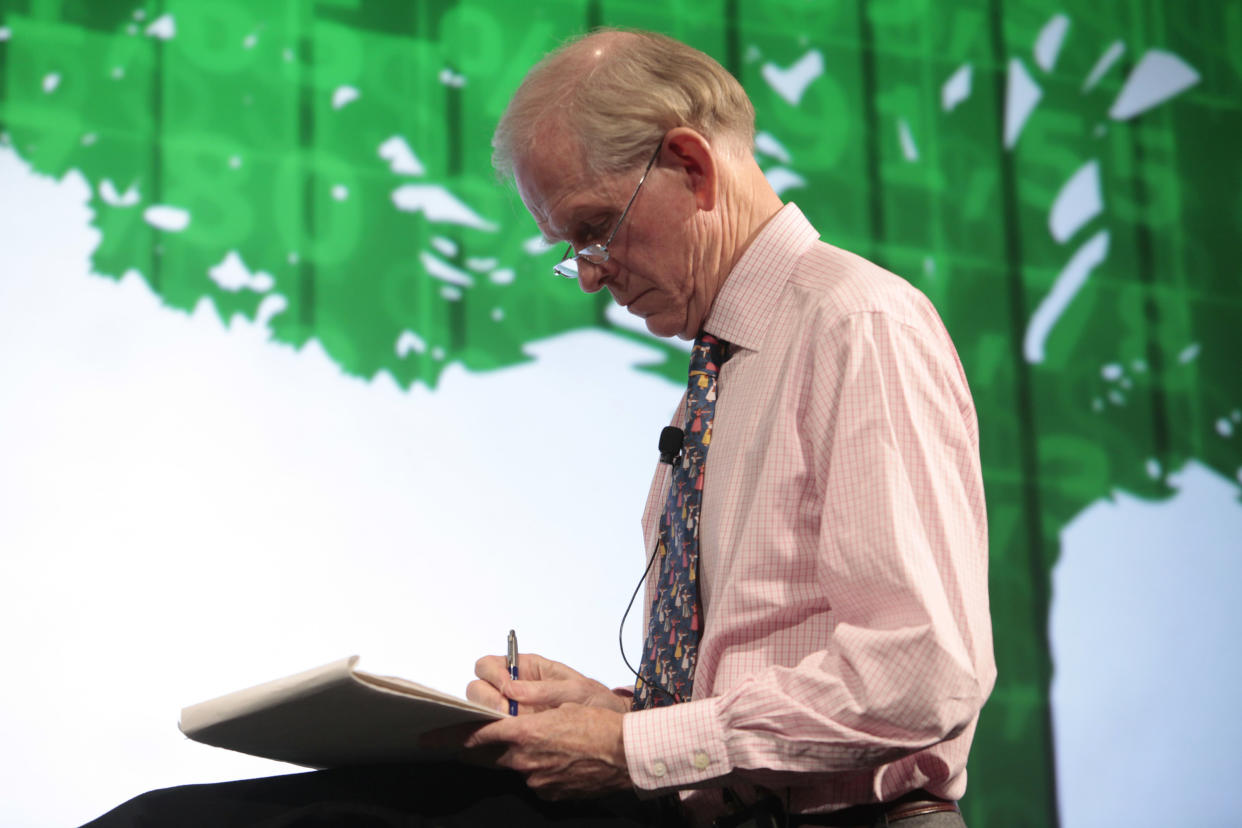 Jeremy Grantham, Co-founder and Chief Investment Strategist of GMO, takes notes during an Oxford-style debate on financial innovation hosted by 