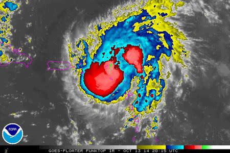 Tropical Storm Gonzalo is seen over the Caribbean Ocean in this NOAA infrared satellite image taken at 16:15EDT (20:15GMT) October 13, 2014. REUTERS/NOAA/Handout