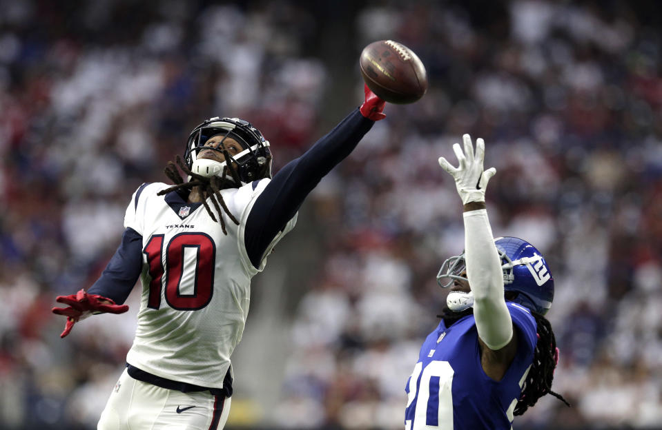 DeAndre Hopkins could have trouble making a catch like this in Week 5. (AP Photo/Michael Wyke)