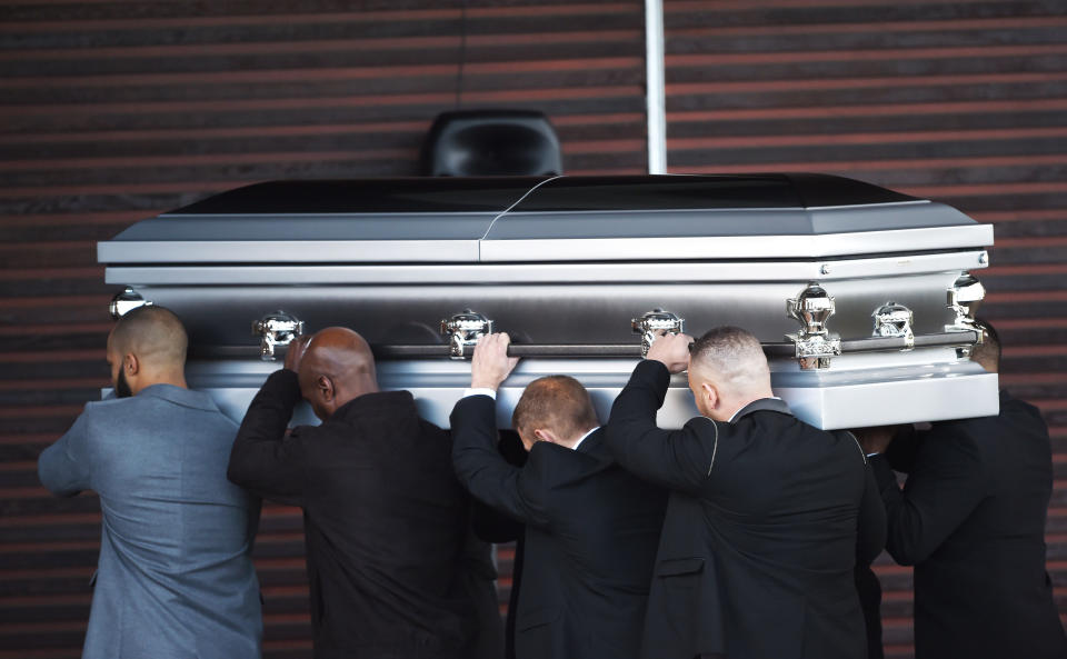 The coffin of Dalian Atkinson is carried into Telford Crematorium Chapel for the funeral of the former Aston Villa footballer who died after being Tasered by police. (Photo by Joe Giddens/PA Images via Getty Images)