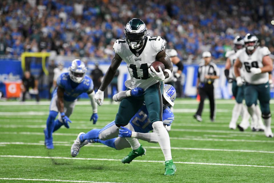 Philadelphia Eagles wide receiver A.J. Brown (11) is tackled by Detroit Lions safety Tracy Walker III (21) in the first half of an NFL football game in Detroit, Sunday, Sept. 11, 2022. (AP Photo/Lon Horwedel)