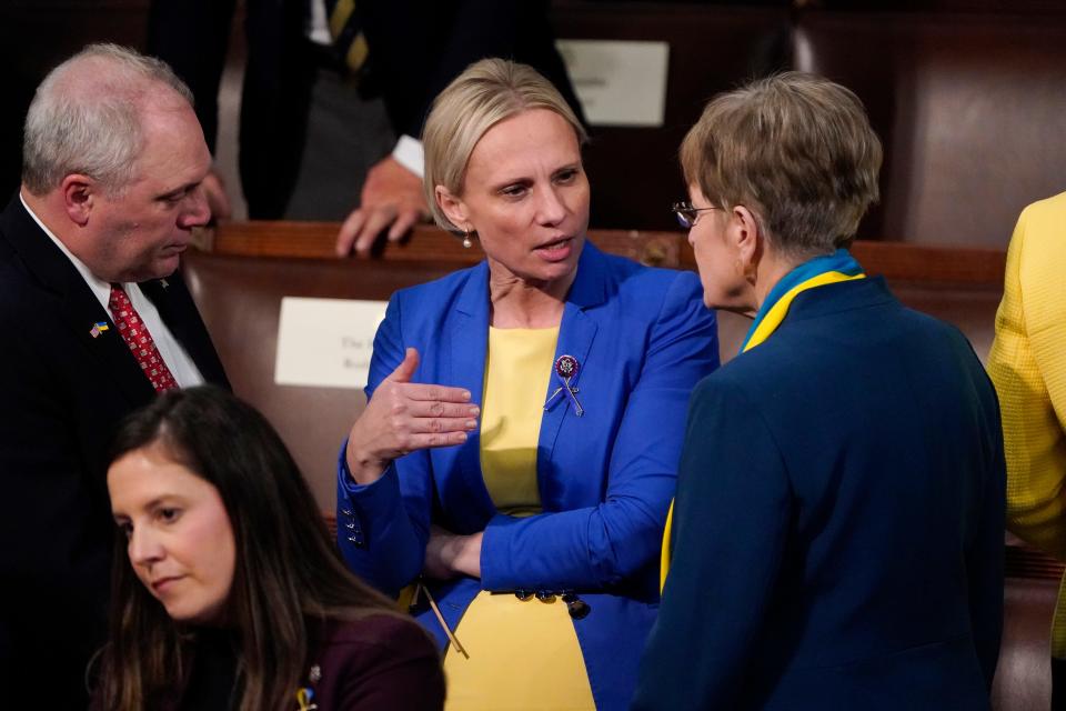 Rep. Steve Scalise, R-La., left, and Rep. Marcy Kaptur, D-Ohio, right, talk with Ukrainian-American Rep. Victoria Spartz, R-Ind., before President Joe Biden delivers his first State of the Union address to a joint session of Congress, at the Capitol in Washington, Tuesday, March 1, 2022.