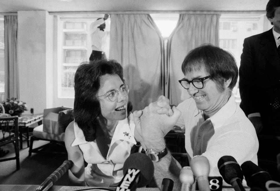 Billy Jean King defeats Billy Riggs in "The Battle of the Sexes."