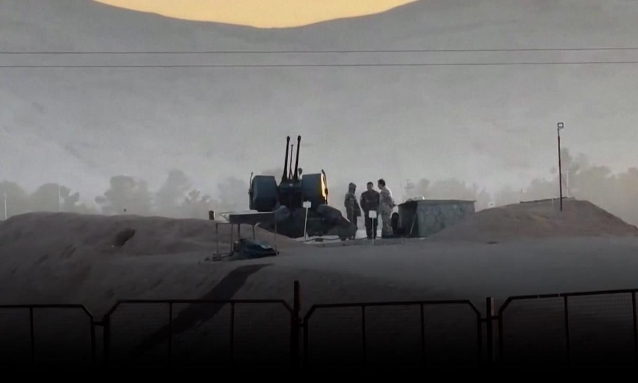 <span>A screengrab of footage broadcast on Friday by Iranian media showing an air defence system in Isfahan.</span><span>Photograph: Wana</span>