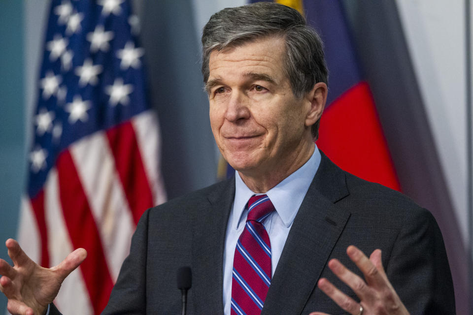 North Carolina Gov. Roy Cooper speaks during a briefing on North Carolina's coronavirus pandemic response Wednesday, Jan. 27, 2021 at the NC Emergency Operations Center in Raleigh, N.C. (Travis Long/The News & Observer via AP)