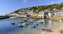 <p>Cornwall is delightful in spring – the wild flowers are out on the coast path, the smell of barbecues drifts through the air and the sea is warming up. Down in Penzance – which is connected to London via a direct rail service – the <a rel="nofollow noopener" href="http://trewiddengarden.co.uk/" target="_blank" data-ylk="slk:Trewidden Garden;elm:context_link;itc:0;sec:content-canvas" class="link ">Trewidden Garden</a> comes into its own. Originally planted in the late 19th Century, the 15 acre grounds come alive with colour as their much-loved ancient magnolia and over 300 varieties of camellias burst into bloom. A short stroll away, stay at <a rel="nofollow noopener" href="http://chapelhousepz.co.uk/" target="_blank" data-ylk="slk:Chapel House;elm:context_link;itc:0;sec:content-canvas" class="link ">Chapel House</a>, a Georgian townhouse with eight beautiful rooms featuring freestanding baths, log fires and local, organic toiletries. B&B doubles from £150. <em>[Photo: Getty]</em> </p>