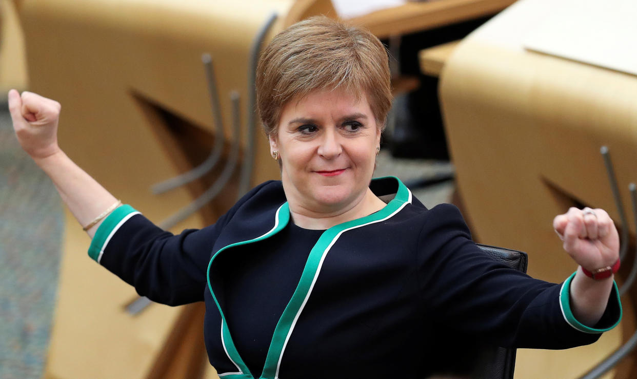 Scotland's First Minister, and leader of the Scottish National Party (SNP), Nicola Sturgeon attends First Minster's Questions (FMQs) in the debating chamber of the Scottish Parliament in Edinburgh on September 17, 2020. - Britain has been the worst-hit country in Europe by COVID-19, recording nearly 42,000 deaths according to government statistics, and has seen positive cases spike dramatically in the last week. (Photo by RUSSELL CHEYNE / POOL / AFP) (Photo by RUSSELL CHEYNE/POOL/AFP via Getty Images)