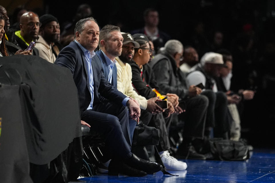 Second gentleman Doug Emhoff, left, watches during the HBCU Classic NCAA college basketball game between Winston-Salem State and Virginia Union in Indianapolis, Saturday, Feb. 17, 2024. (AP Photo/Michael Conroy)