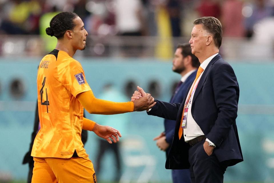 Netherlands coach Louis van Gaal shakes hands with Virgil van Dijk (REUTERS)