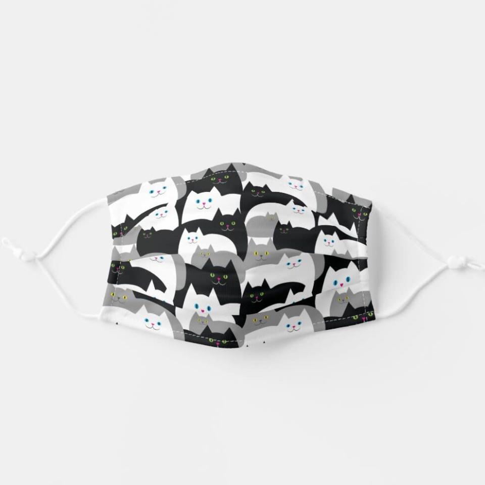 Product photo of a Funny Black, Gray and White Kitty Cats Adult Cloth Face Mask on a gray background