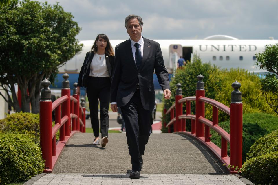 U.S. Secretary of State Antony Blinken prepares to speak to the media before boarding his airplane at Yokota Air Base in Fussa on the outskirts of Tokyo Monday, July 11, 2022. Blinken arrived Monday on a previously unscheduled stop to Tokyo to offer condolences in person over the assassination of former Prime Minister Shinzo Abe. (Stefani Reynolds/Pool Photo via AP)