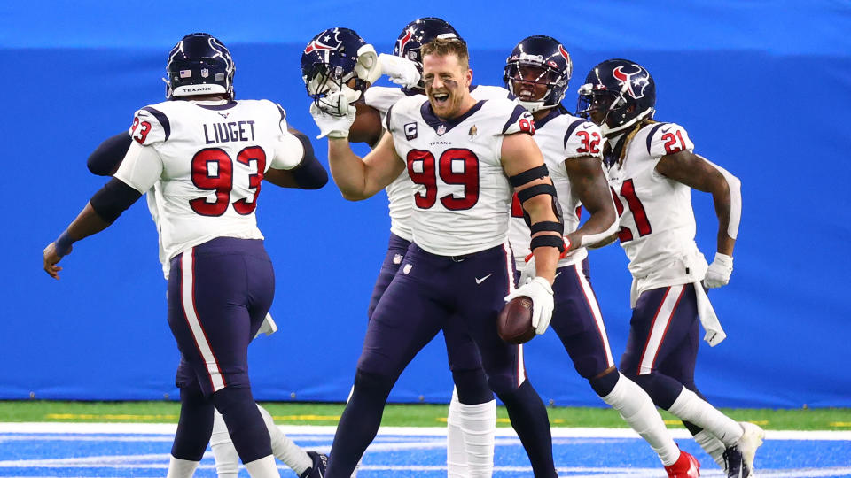 DETROIT, MICHIGAN - NOVEMBER 26: J.J. Watt #99 of the Houston Texans celebrates a touchdown after intercepting a pass during the first half against the Detroit Lions at Ford Field on November 26, 2020 in Detroit, Michigan. (Photo by Rey Del Rio/Getty Images)