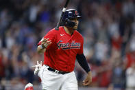 Cleveland Guardians' Josh Naylor tosses his bat after hitting a game-winning, two-run home run against the Minnesota Twins during the 10th inning of a baseball game Wednesday, June 29, 2022, in Cleveland. (AP Photo/Ron Schwane)