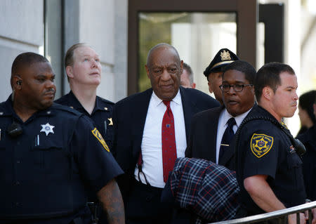 Actor and comedian Bill Cosby exits Montgomery County Courthouse after a jury convicted him in a sexual assault retrial in Norristown, Pennsylvania, U.S., April 26, 2018. REUTERS/Brendan McDermid/Files