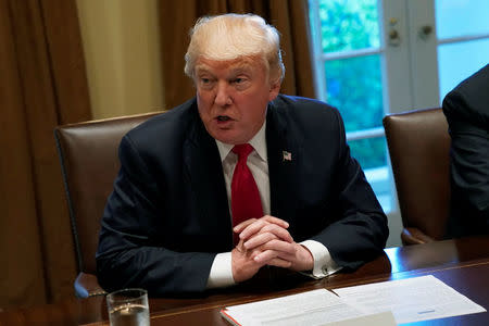 U.S. President Donald Trump participates in a briefing with senior military leaders at the White House in Washington, U.S., October 5, 2017. REUTERS/Yuri Gripas