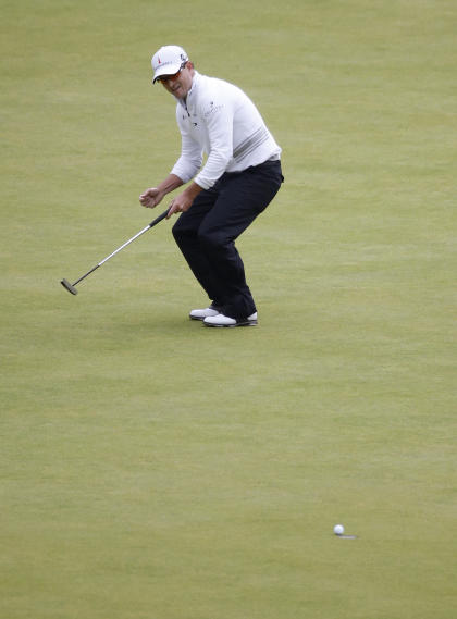 Zach Johnson's birdie on 18 pushed him to 15-under par. (AP)