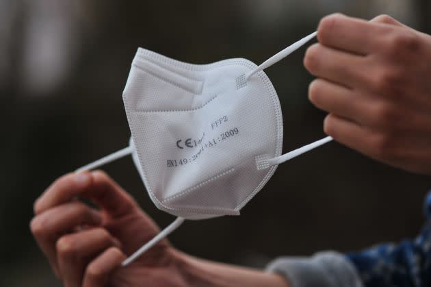 A woman wearing an FFP2 Covid19 mask in L'Aquila, Italy, on December 28, 2021. FFP2 is mandatory for some places in Italy such as cinemas, stadiums and theaters (Photo by Lorenzo Di Cola/NurPhoto via Getty Images) (Photo: NurPhoto via NurPhoto via Getty Images)