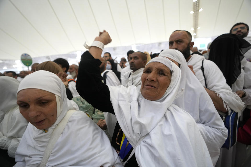 Muslim pilgrims cast stones in the symbolic stoning of the devil ritual during the Hajj pilgrimage, in Mina near the city of Mecca, Saudi Arabia, Saturday, July 9, 2022. (AP Photo/Amr Nabil)