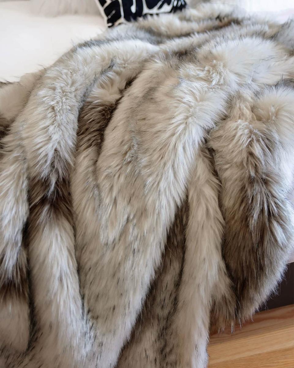 <p><a href="https://go.redirectingat.com?id=74968X1596630&url=https%3A%2F%2Fwww.neimanmarcus.com%2Fp%2Ffabulous-furs-limited-edition-faux-fur-throw-prod215220155&sref=https%3A%2F%2Fwww.harpersbazaar.com%2Ffashion%2Ftrends%2Fg46340179%2Fbest-throw-blankets%2F" rel="nofollow noopener" target="_blank" data-ylk="slk:Shop Now;elm:context_link;itc:0;sec:content-canvas" class="link ">Shop Now</a></p><p>Limited Edition Faux-Fur Throw</p><p>neimanmarcus.com</p><p>$350.00</p>