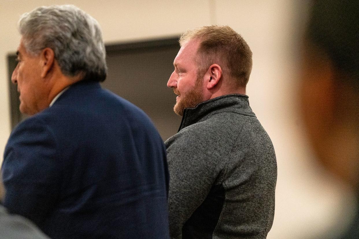 Tyler Zanella, 36, stands next to his attorney, Andy Gavaldon, in court at the Larimer County Justice Center in Fort Collins, Colo., on Friday, Dec. 8, 2023.