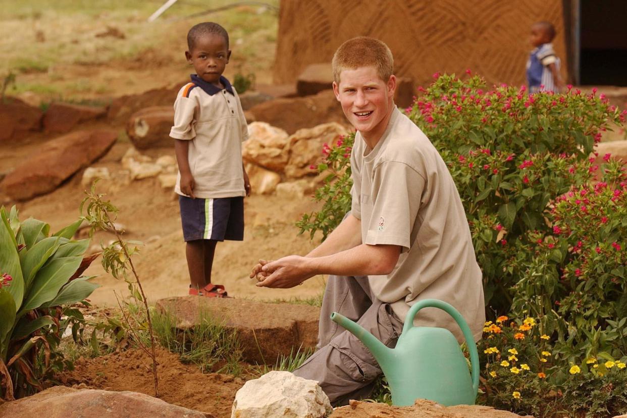 Prince Harry befriended young orphan Mutsu Potsane 14 years ago on a gap year stay in Losotho: PA Archive/PA Images