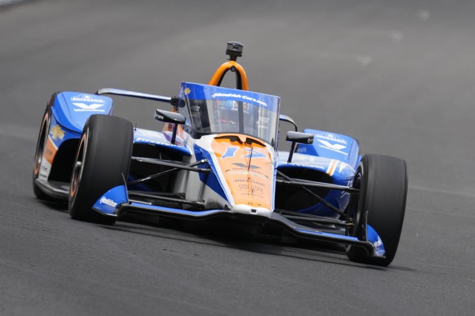 Kyle Larson drives into a turn during a practice session for the Indianapolis 500 auto race at Indianapolis Motor Speedway, Monday, May 20, 2024, in Indianapolis. (AP Photo/Darron Cummings)