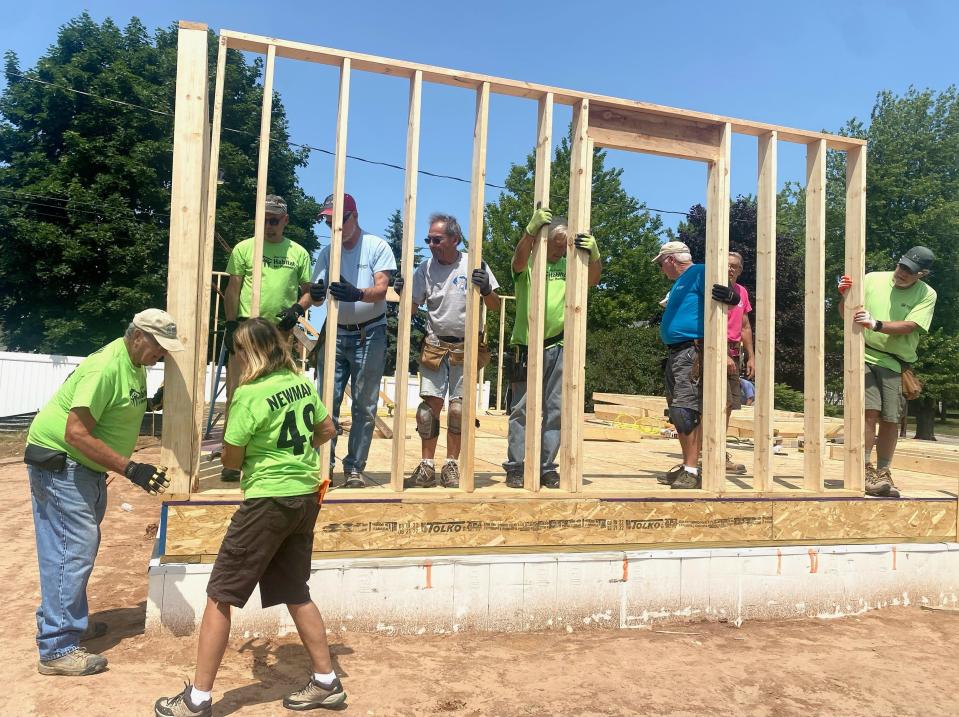 Volunteers work on building a Door County Habitat for Humanity home. The local organization announced it isn't building a new home for a family in 2024 largely because of rising costs and a lack of funds, the first time in its history it won't build.