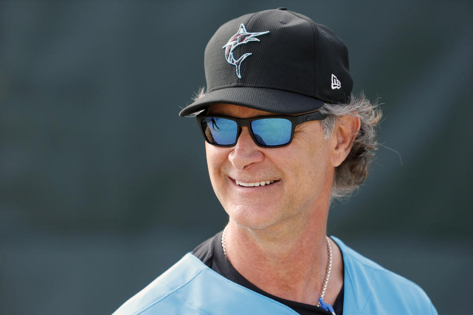 FILE - In this Sunday, Feb. 16, 2020, file photo, Miami Marlins manager Don Mattingly watches his team during spring training baseball practice in Jupiter, Fla. Don Mattingly returns this weekend to Yankee Stadium, where his best years as a player always ended when the regular season did. Now Mattingly is enjoying perhaps his best year as a manager, and his surprising Miami Marlins could be playoff-bound for the first time since 2003.(AP Photo/Jeff Roberson, File)