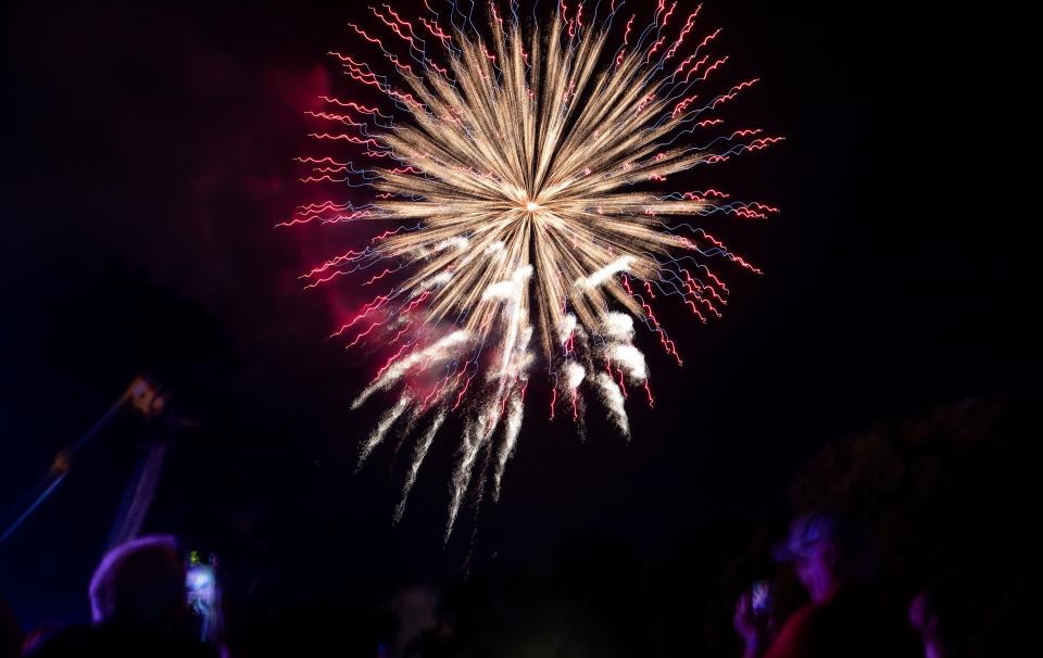 Family and friends gather at the city of Tallahassee's Celebrate America music and firework display Monday, July 4, 2022 at Tom Brown Park.