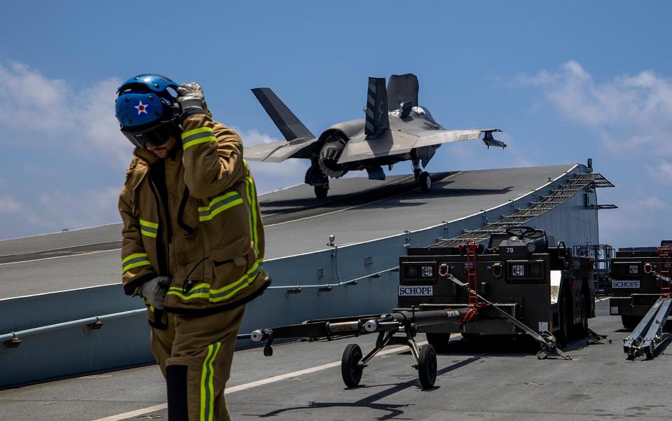 Ready for takeoff: crew on board the HMS Queen Elizabeth prepare F-35B fighter jets to take part in their first ever combat operation