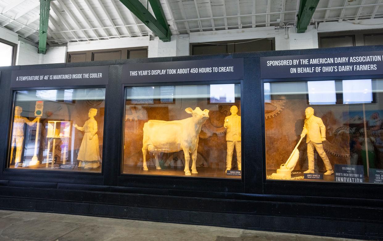 The Butter Cow exhibit at the Ohio State Fair.This year, a team of Ohio-based sculptors created the display in 450 hours using 2,000 pounds of butter donated in part by Dairy Farmers of America.