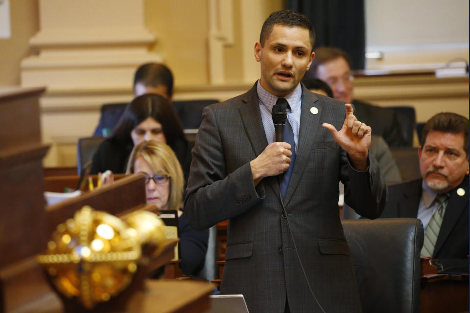 Del. Sam Rasoul, D-Roanoke, gestures during debate on the renewable energy bill on the floor of the House at the Capitol, Thursday, March 5 , 2020, in Richmond, Va. Rasoul offered amendments that were rejected. (AP Photo/Steve Helber)