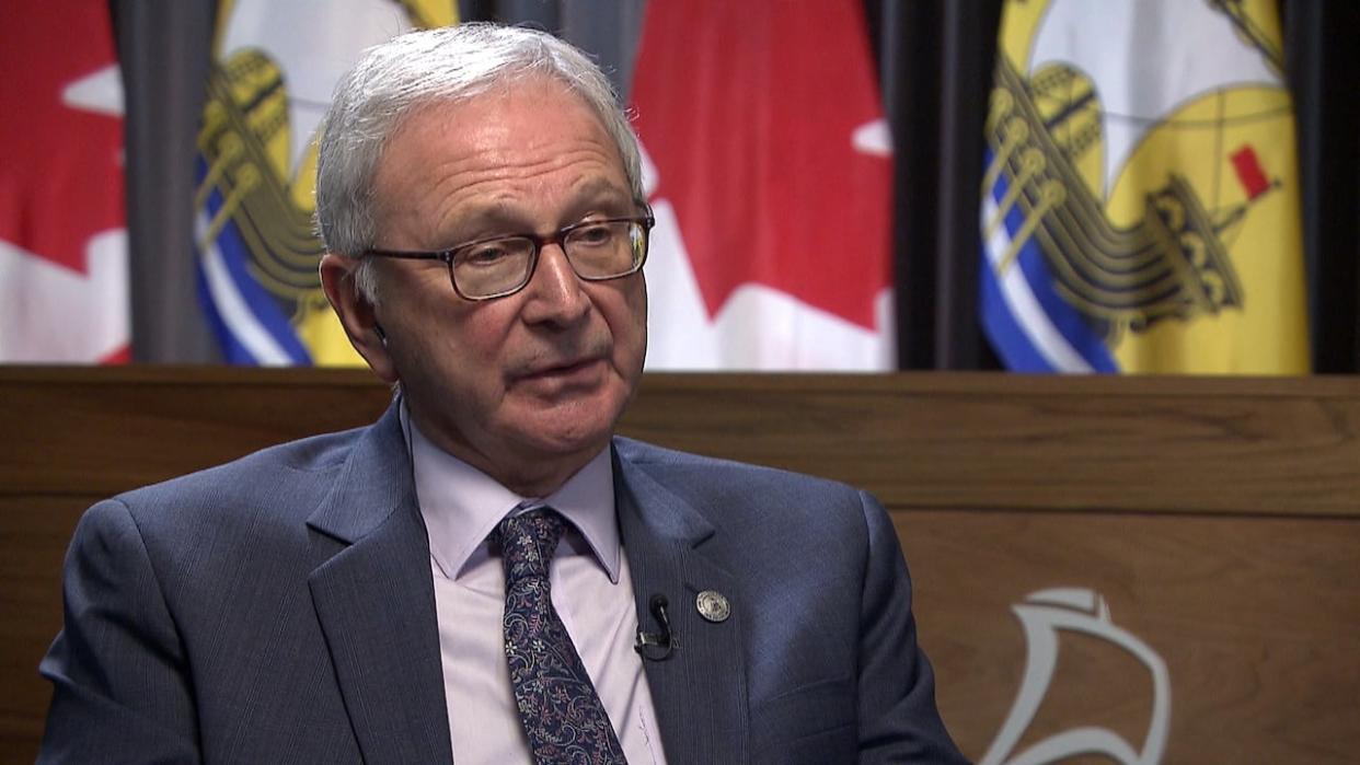 Premier Blaine Higgs is being criticized for similar videos promoting his government's health care strategy posted to both an official Government of New Brunswick account and a PC party account. (Radio-Canada - image credit)