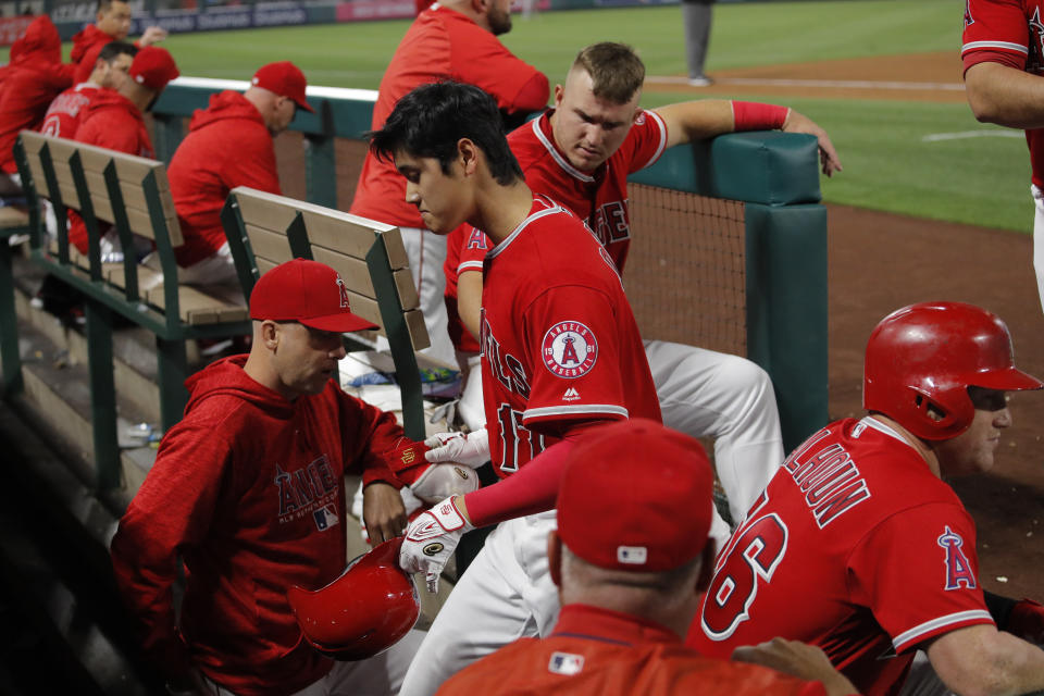 Shohei Ohtani is day-to-day with an ankle sprain, throwing a matchup with fellow Japanese pitcher Masahiro Tanaka in doubt. (AP Photo)