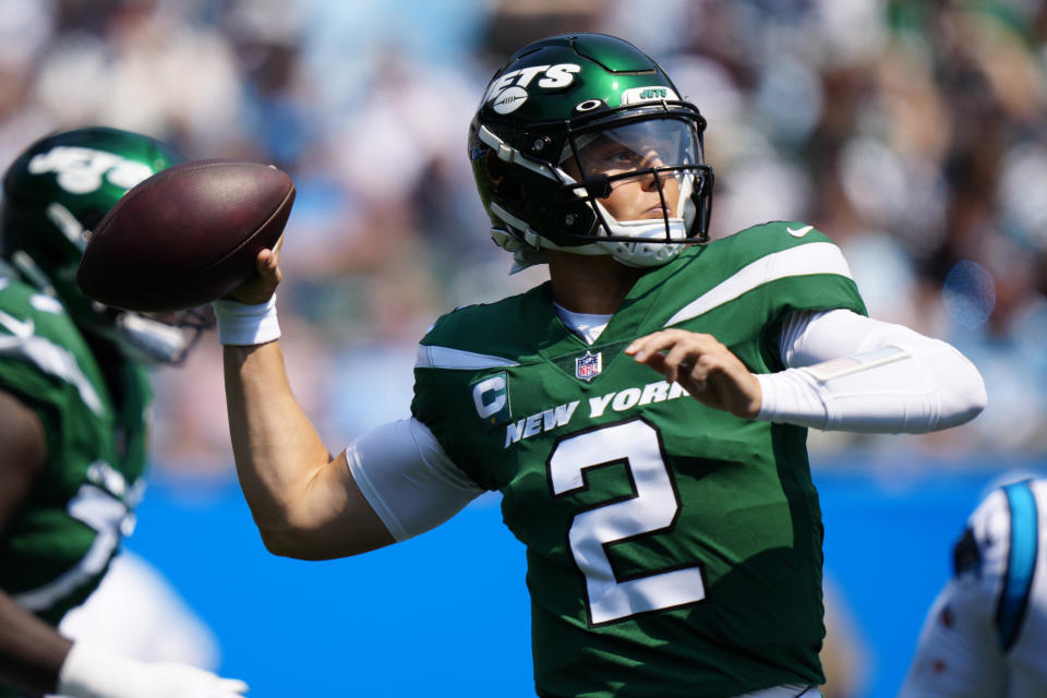New York Jets quarterback Zach Wilson passes against the Carolina Panthers during the first half of an NFL football game Sunday, Sept. 12, 2021, in Charlotte, N.C. (AP Photo/Jacob Kupferman)