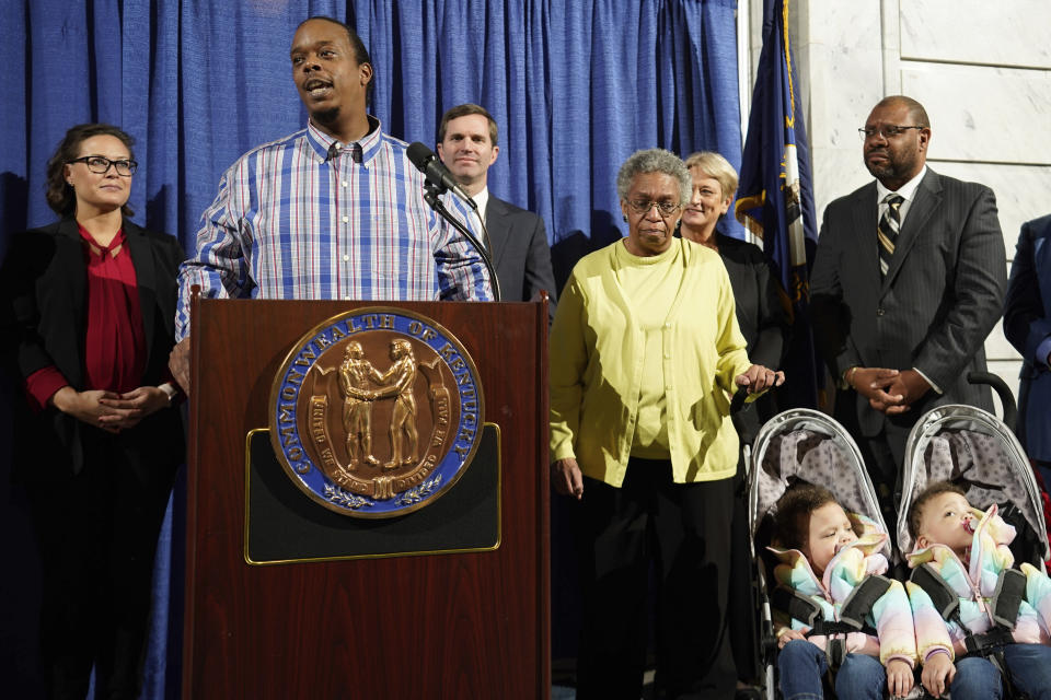 Rynn Young, of Louisville, Kentucky, speaks at a press conference before Kentucky Democratic Governor Andy Beshear signs an executive order to reinstate the voting rights of over 100,000 non-violent felons who have completed their sentences, at the Capitol in Frankfort, Ky., Thursday, Dec. 12, 2019. Young was convicted of a drug possession when he was 18 and will have his voting rights restored with today's order. (AP Photo/Bryan Woolston)