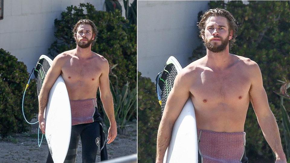 Liam Hemsworth bares all before a day in the surf