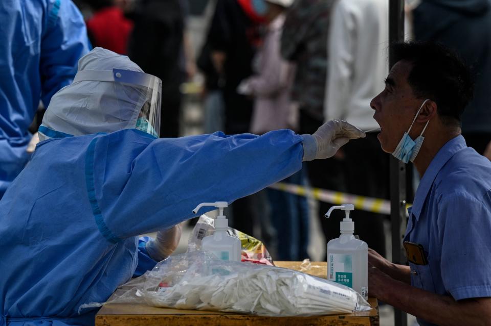 Oil fell as coronavirus cases rise in the China, and authorities in Beijing have started a mass testing push after a recent sharp spike. Photo: Jade Gao/AFP via Getty