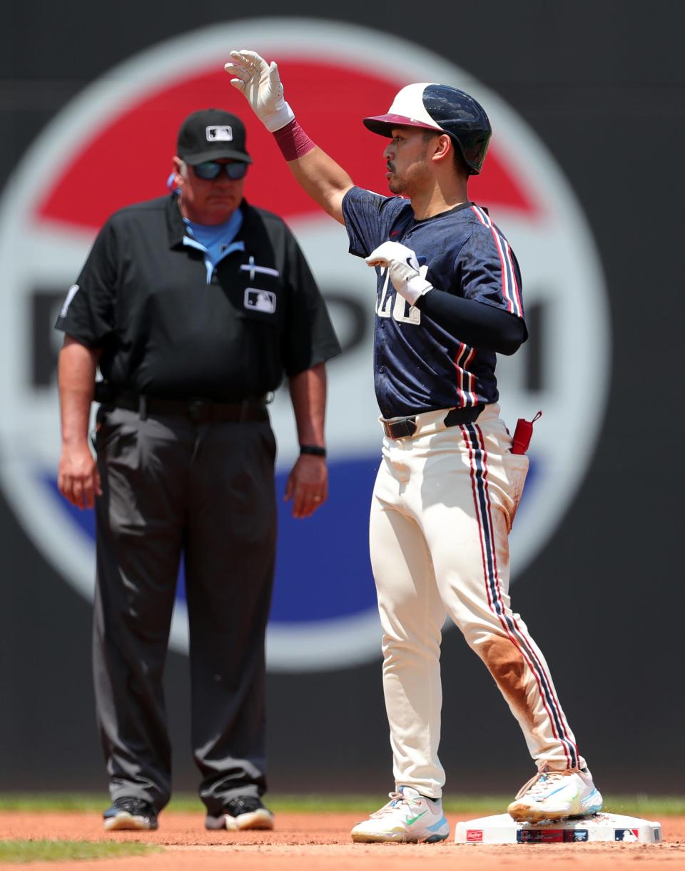 Cleveland Guardians' Steven Kwan (38) celebrates at second after a double June 20 in Cleveland.