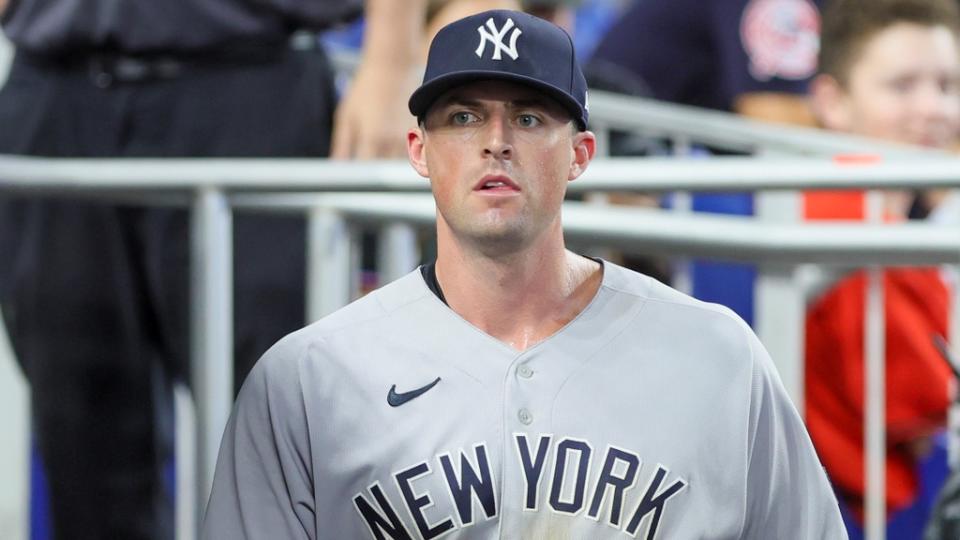 Aug 13, 2023; Miami, Florida, USA; New York Yankees relief pitcher Clay Holmes (35) looks on from the dugout after leaving the game against the Miami Marlins during the ninth inning at loanDepot Park. Mandatory Credit: Sam Navarro-USA TODAY Sports