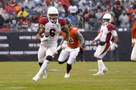Arizona Cardinals running back James Conner (6) carries the ball in the open field as Chicago Bears inside linebacker Danny Trevathan pursues during the second half of an NFL football game Sunday, Dec. 5, 2021, in Chicago. (AP Photo/David Banks)