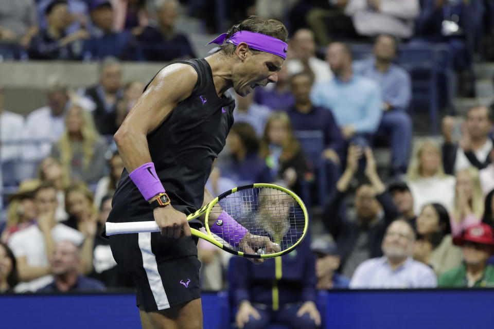 Rafael Nadal, of Spain, reacts after scoring a point against Matteo Berrettini, of Italy, during the men's singles semifinals of the U.S. Open tennis championships Friday, Sept. 6, 2019, in New York. (AP Photo/Adam Hunger)