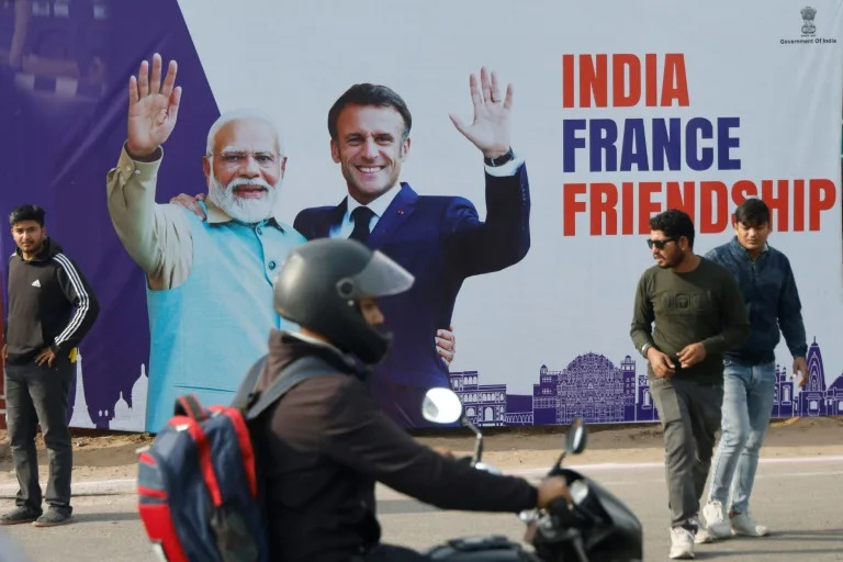 A poster in the Indian city of Jaipur on Thursday, where French President Emmanuel Macron is being hosted by Prime Minister Narendra Modi (Ludovic MARIN)