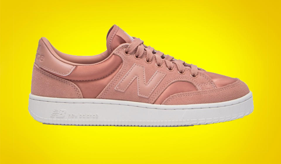 Satin-like fabric gives these sporty kicks a luxe touch. (Photo: New Balance)