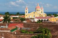 <p>Along with its volcanoes, freshwater lakes, and rainforests brimming with wildlife, Nicaragua lures foreign retirees with a bevy of financial incentives. These include the ability for retirees to import up to $20,000 of household goods (such as furniture, clothing, etc.) and a car up to $25,000 in value, duty-free. Another motivator: All foreign income is tax-free.</p> <p>The advantages of Nicaragua’s <a href="https://us.iasservices.org.uk/how-to-retire-in-nicaragua/" rel="nofollow noopener" target="_blank" data-ylk="slk:Pensionado Residency program;elm:context_link;itc:0;sec:content-canvas" class="link ">Pensionado Residency program</a>, which is renewable after five years, don’t end there. Once you receive a residency card, which grants retiree status (it takes up to 6 months once you’ve submitted your application), you can open a local bank account, use credit to shop, and even get a local phone plan. For those looking to build a home, retirees can also purchase up to $50,000 of construction materials tax-free.</p> <p><strong>Requirements:</strong> Foreign nationals can retire in Nicaragua at the age of 45 as long as they have a permanent passive income of $650 per month (plus $150 per month for each dependent). You’re also required to spend at least 6 months (which can be non-consecutive) per year within the country to keep residency status.</p>