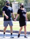 <p>Lea Michele, who’s expecting her first child, holds hands with her husband Zandy Reich while on a walk in Santa Monica on Monday. </p>