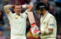 Australia paceman Peter Siddle reacts after bowling to New Zealand's Trent Boult in the third Test at the Adelaide Oval on November 27, 2015