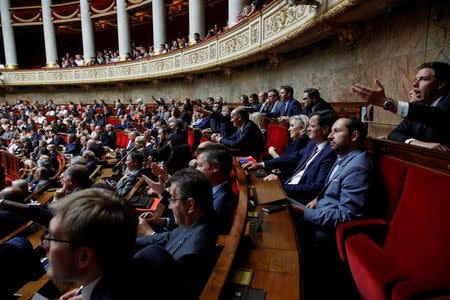 French members of parliament react during the speech of French Prime Minister Edouard Philippe during the questions to the government session at the National Assembly in Paris, France, July 24, 2018. REUTERS/Philippe Wojazer